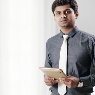 Elegant living room design with warm lighting in a Mysore home